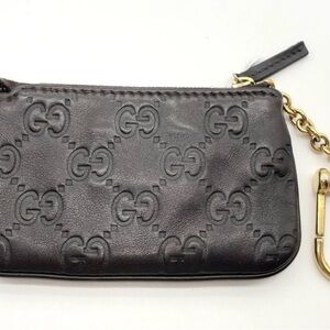 Gucci Dark Leather Wristlet with Gold Chain